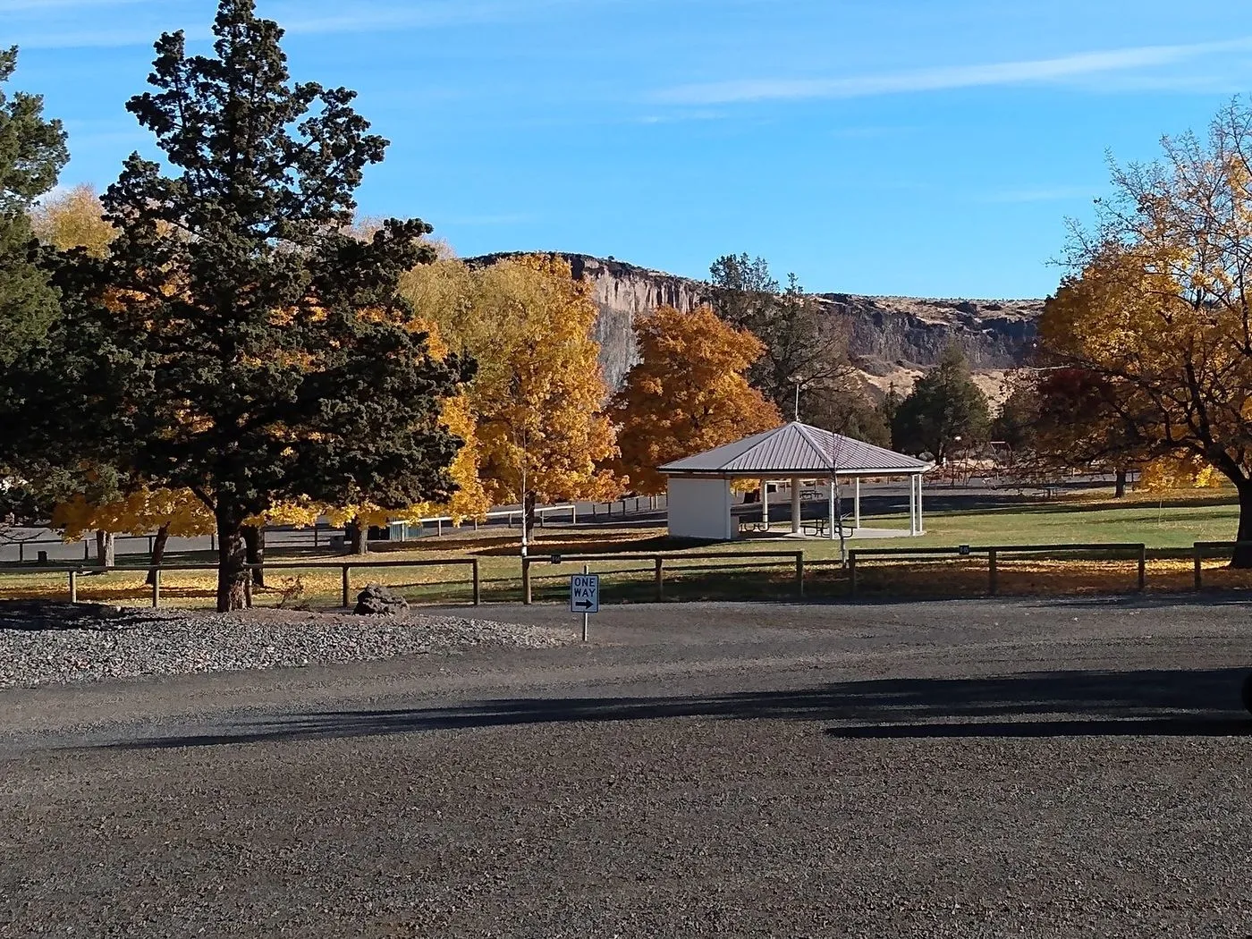 Gazebo and autumn trees in the park